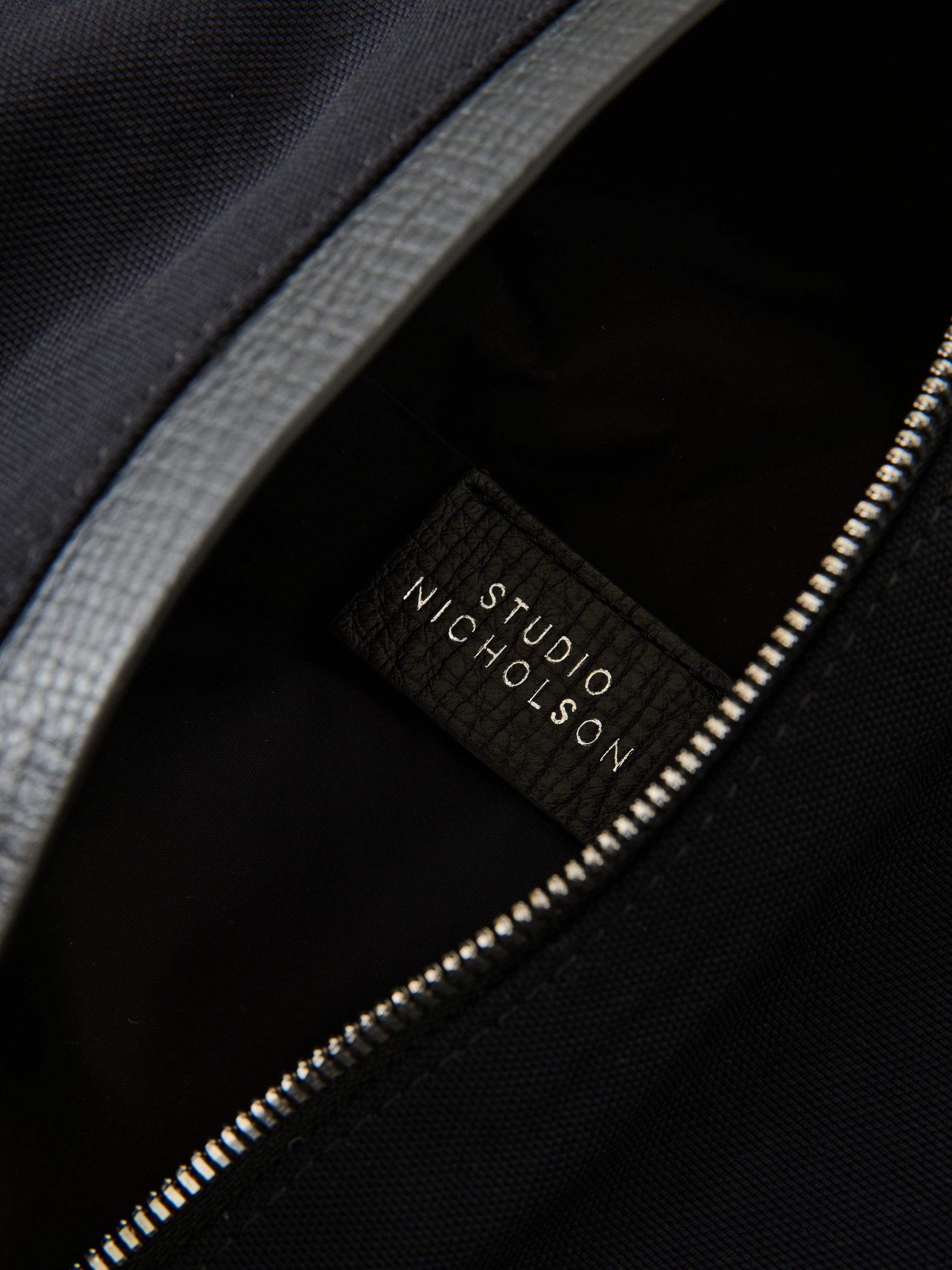 Cross Duffle Bag in Black - Studio Nicholson