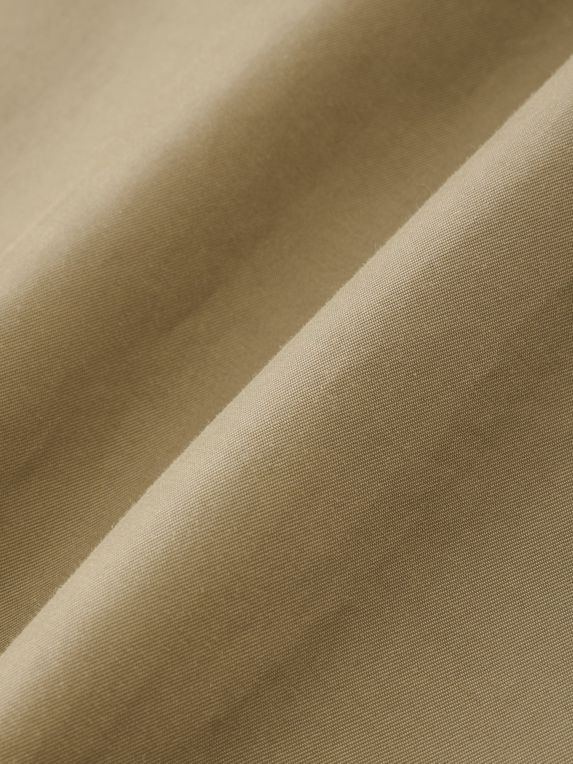 Holin Coated Cotton Coat in Dark Dusk - Studio Nicholson