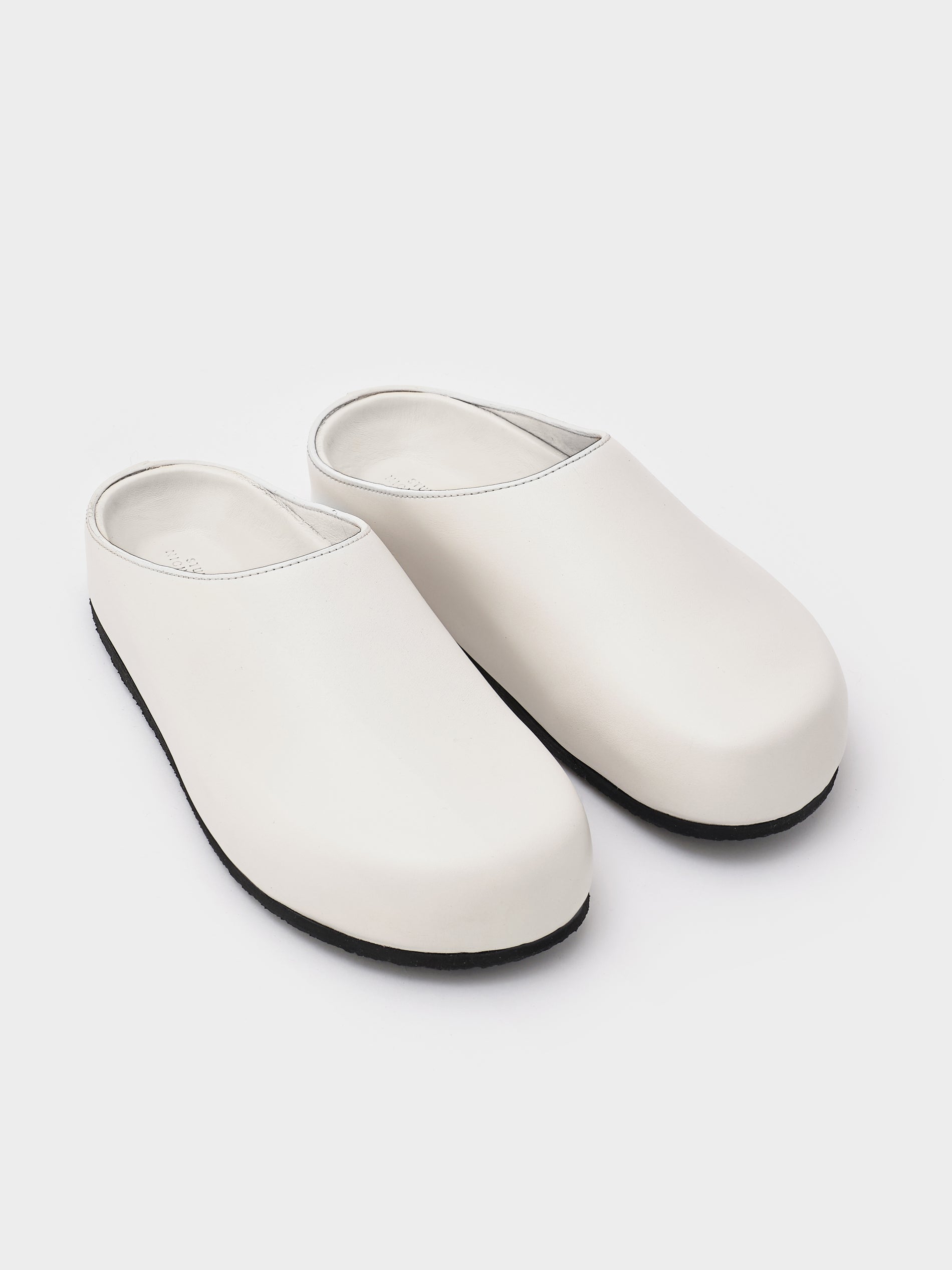 Women's Wearing Clog in Milk
