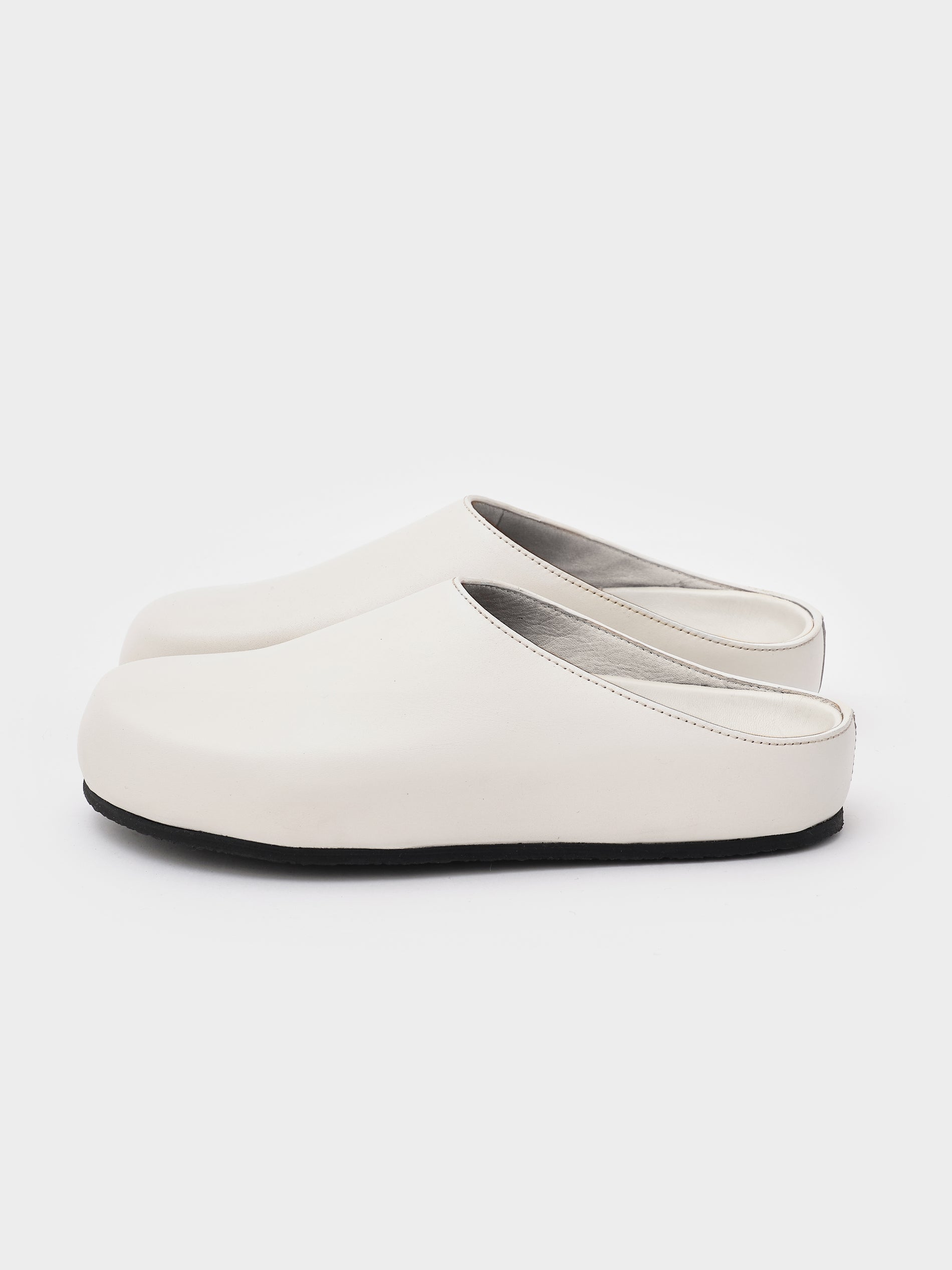 Women's Wearing Clog in Milk